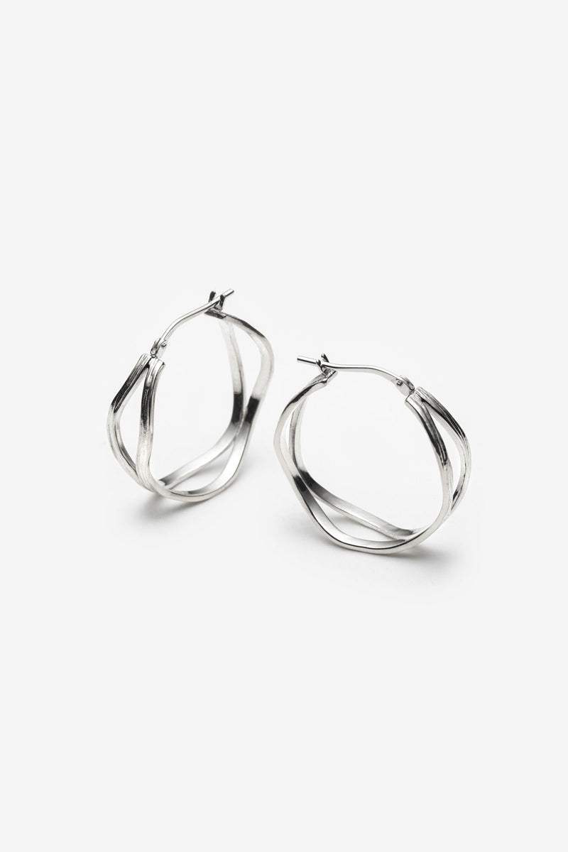 Big silver double wave earrings Montreal
