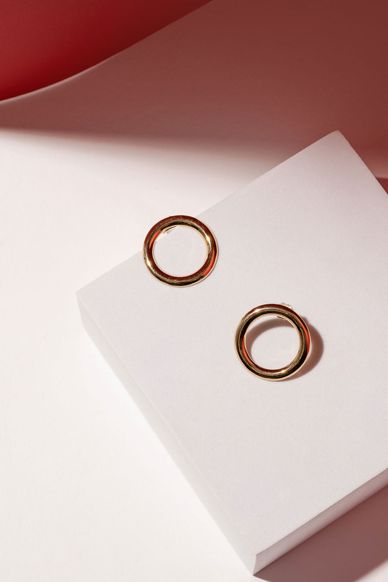 large circle stud earrings in gold plated silver