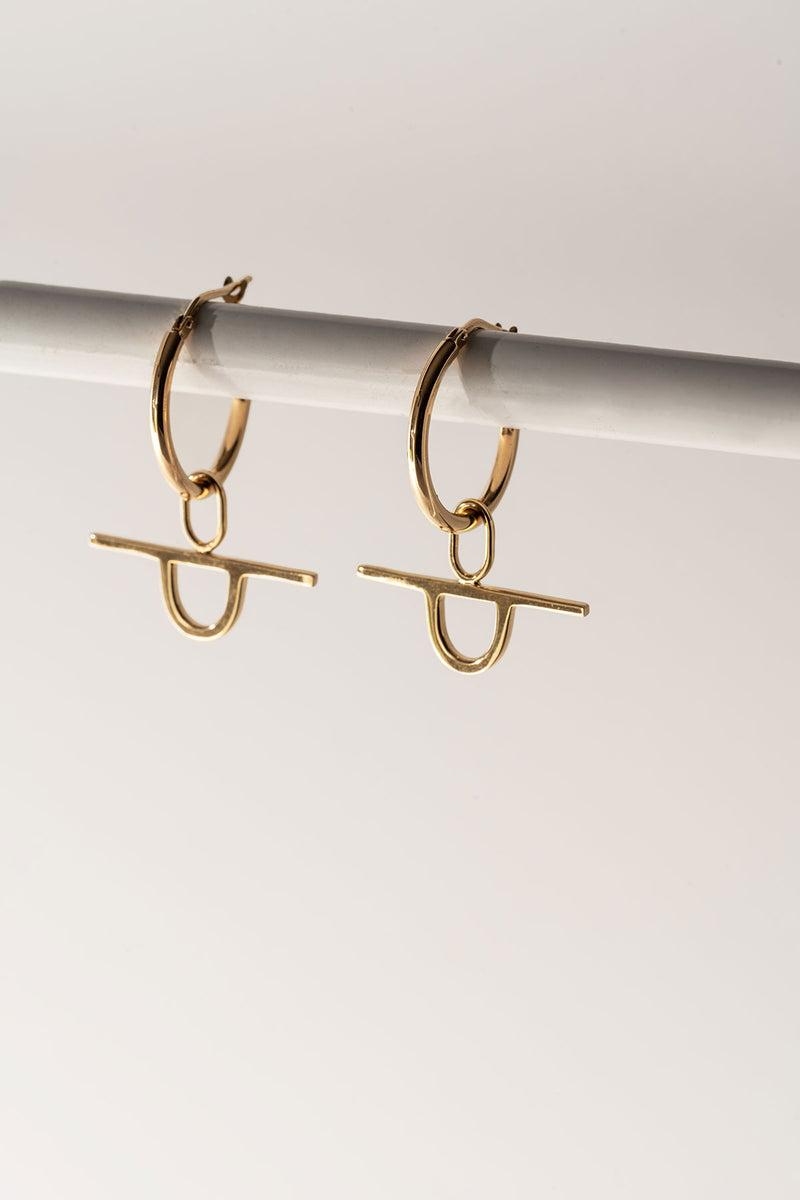 Geometric gold charm hoop earrings made in Canada