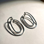 Twisted, Oval loop sterling silver earrings