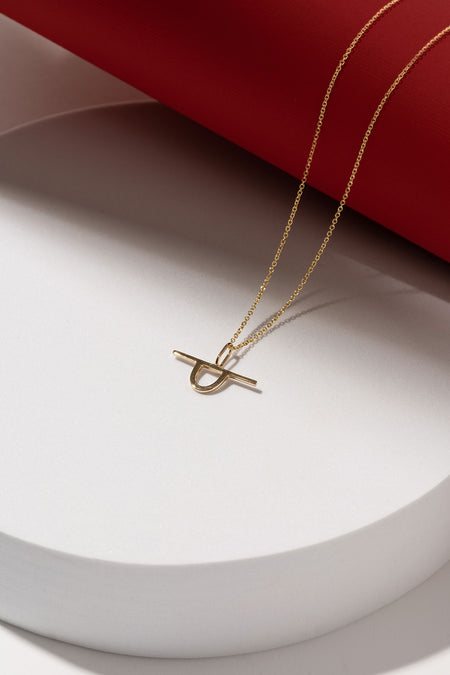 Geometric gold charm necklace on thin chain - Canada