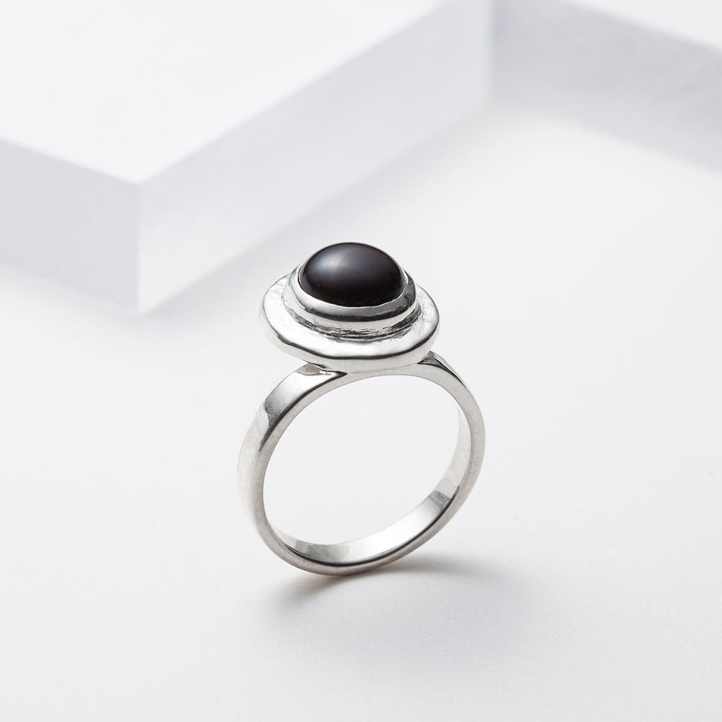 Off centered sterling silver black onyx ring