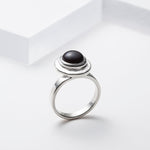 Off centered sterling silver black onyx ring