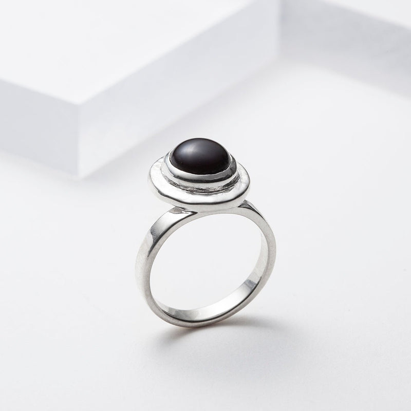 Off centered sterling silver black onyx ring