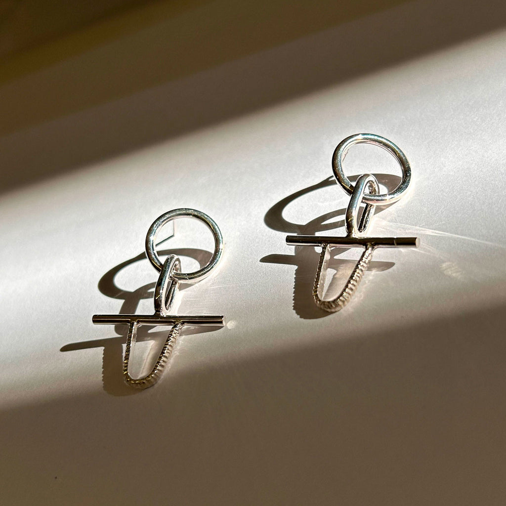 designer silver earrings Montreal