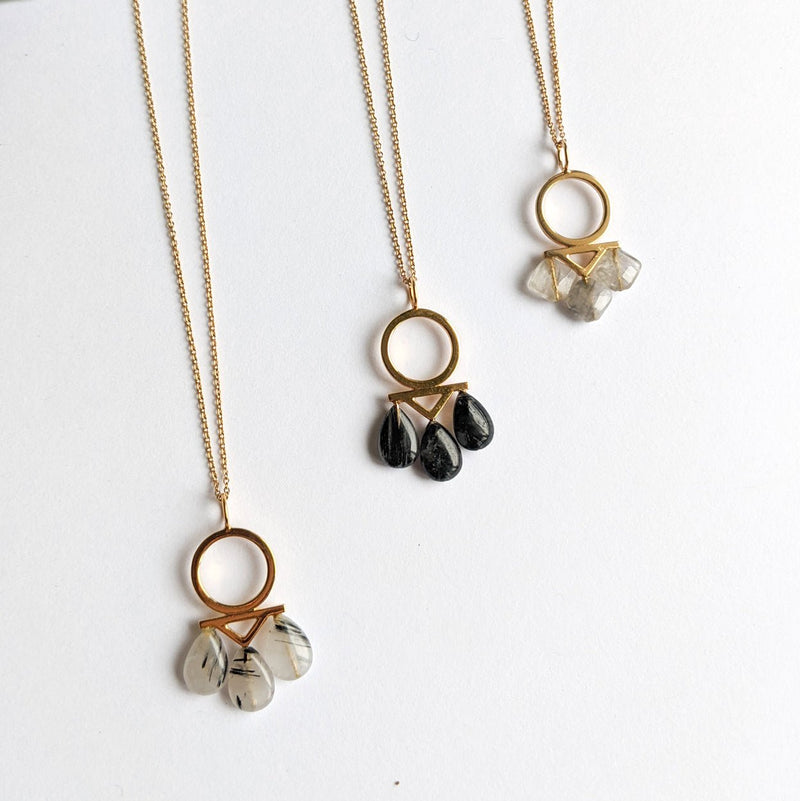 Gold plated onyx, rutilated quartz and onyx, three stones necklace 