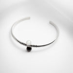 Atlas, open silver bangle with gemstones