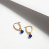 Gols plated silver everyday hoop earrings with blue stone charms