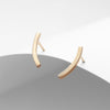 Gold plated long curved bar stud earrings