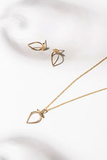 Matching drop-shaped necklace and earrings set gold plated silver