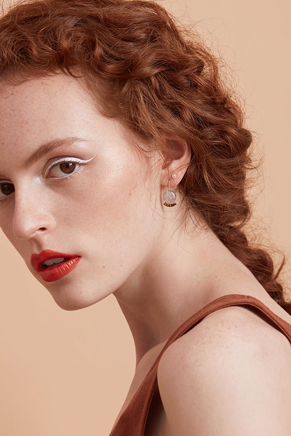 Long rose gold plated hammered curved bar with grey stone ear studs