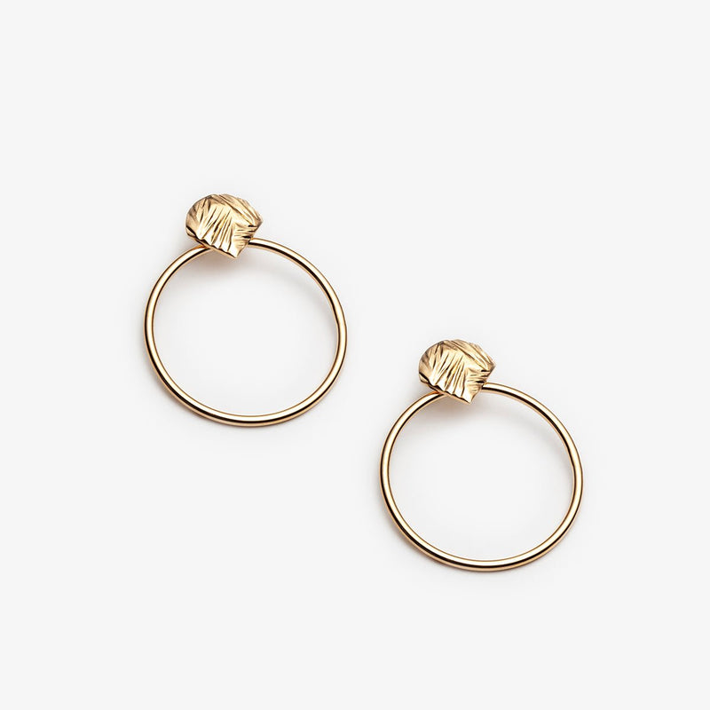 Large forward facing hoop earrings gold