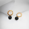 Gold plated silver circle post earrings with black onyx
