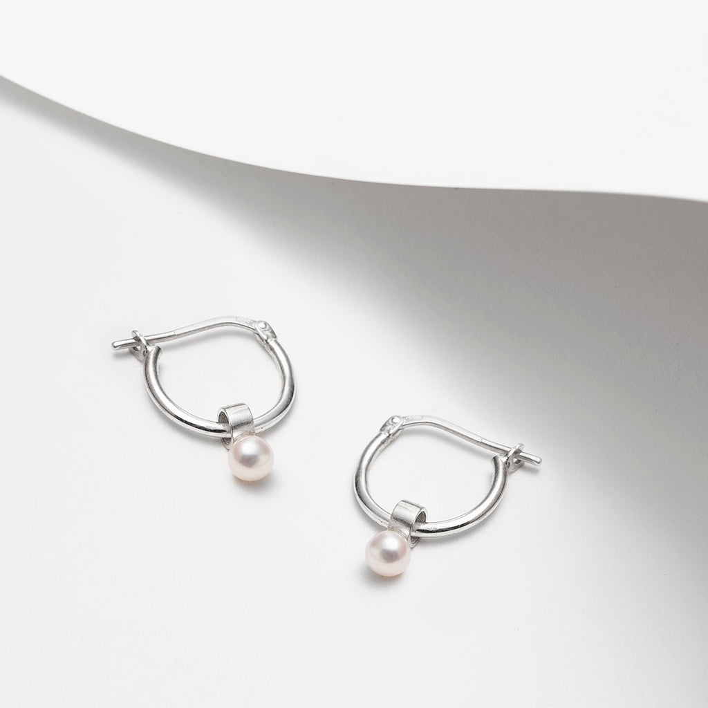 Hoop earrings with hanging pearl