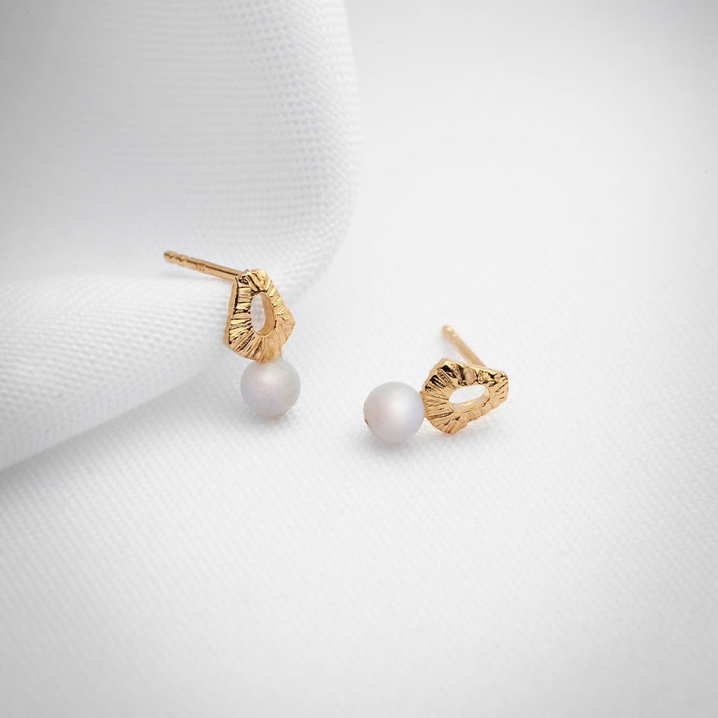 Delicate gold stud earrings with blue lace agate