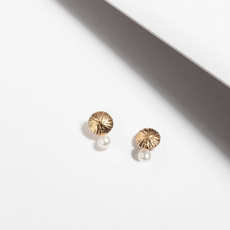 Small gold plated silver dome disk stud earrings with freshwater pearls