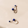 J shaped sterling silver stud earrings with lapis lazuli