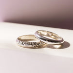 Matching silver wedding bands rings for him and her