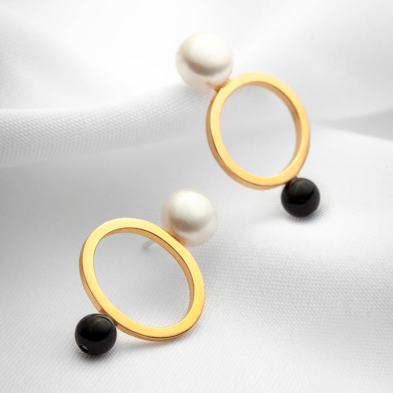 Gold large open oval stud earrings with big pearls and black onyx stones