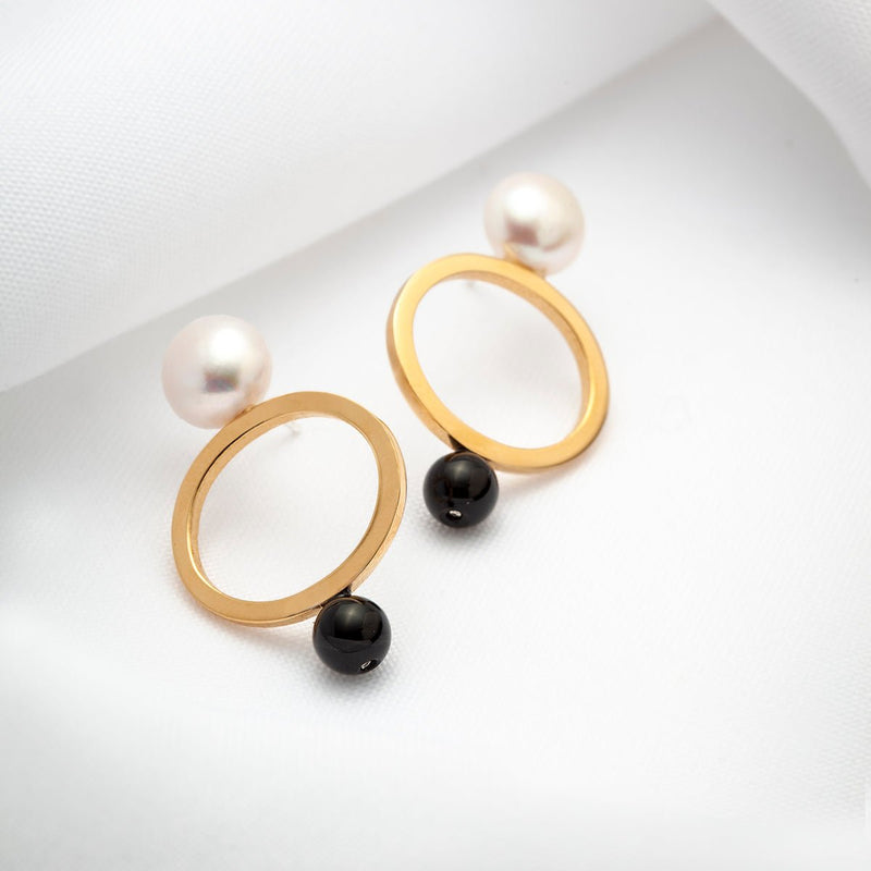 Gold plated open oval earrings with large pearls and black onyx stones