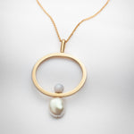 Long gold necklace with oval pendant big baroque pearl and blue lace agate stone