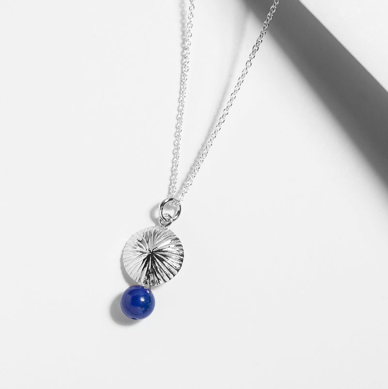 Sterling silver textures dome charm necklace with lapis lazuli blue stone