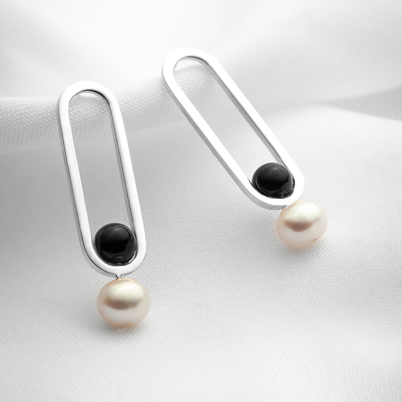 Designer sterling silver stud earrings with black onyx stones and white pearls